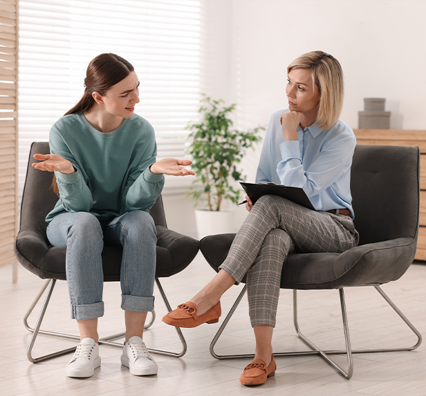 Professional psychotherapist working with patient in office